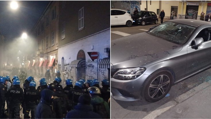 corteo-degli-anarchici-in-centro:-scontri-con-la-polizia-e-bombe-carta.-danneggiate-7-vetrine-di-banche,-vetri-delle-auto-spaccati